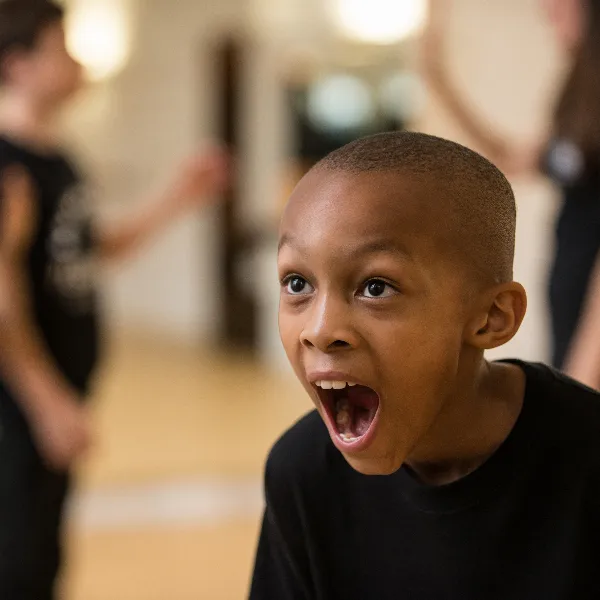 Child acting in drama class